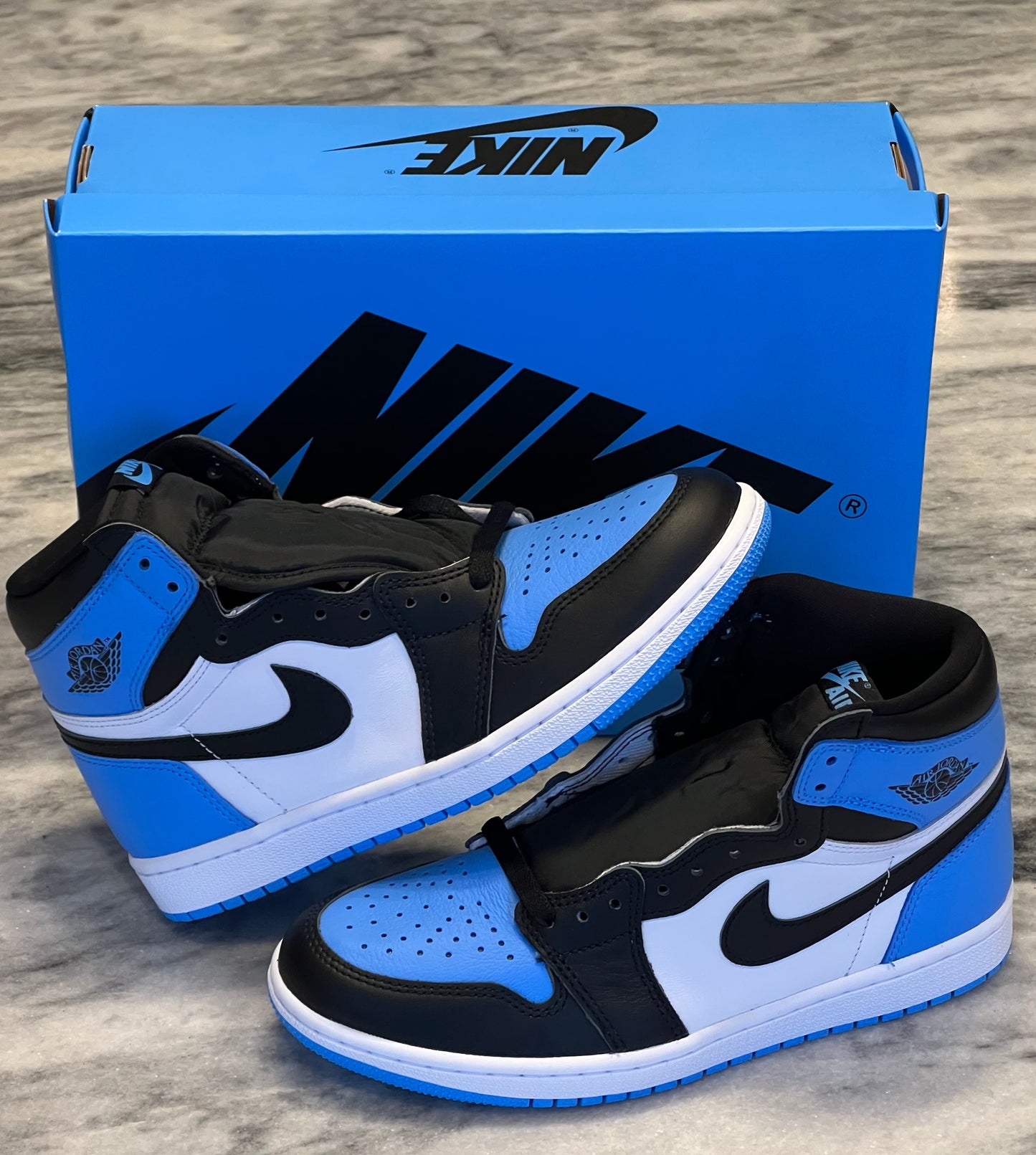 Air Jordan 1 Retro High OG 'UNC Toe' Size: 7 & 7.5